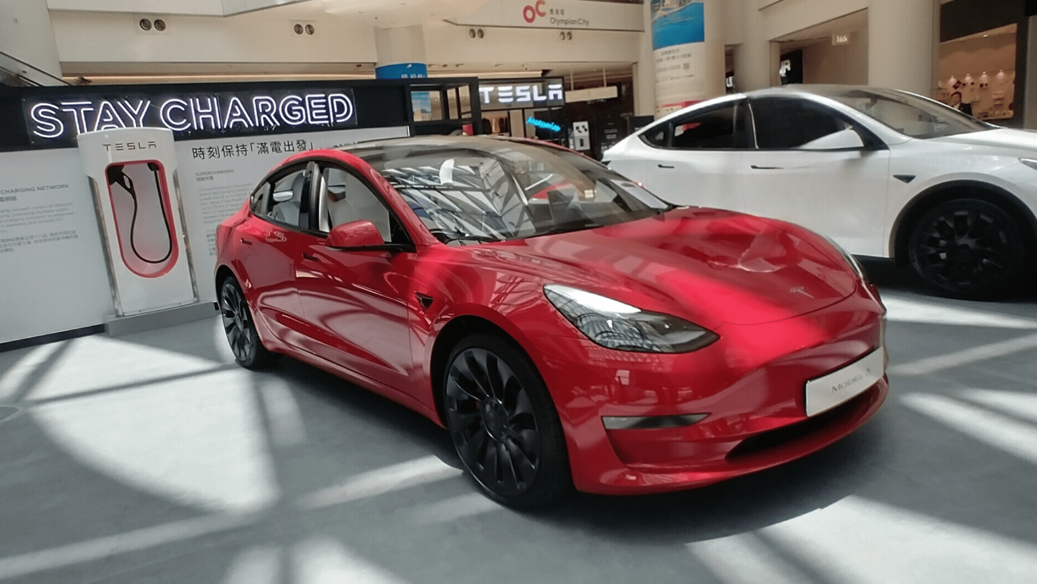 Tesla model 3 promotional display in Olympian City.